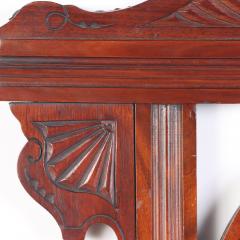 A Victorian carved mahogany wall mirror with shaped beveled mirror circa 1880  - 2276222