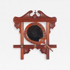 A Victorian carved mahogany wall mirror with shaped beveled mirror circa 1880  - 2278876