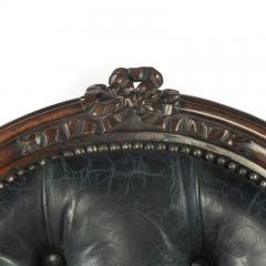 A Victorian rosewood medallion backed open arm chair by Holland Sons - 3081054