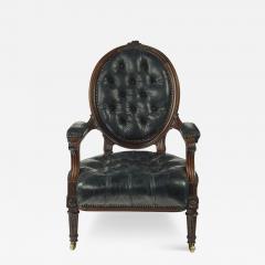 A Victorian rosewood medallion backed open arm chair by Holland Sons - 3084832