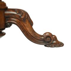 A Victorian walnut revolving display table - 2846724