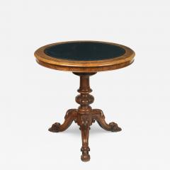 A Victorian walnut revolving display table - 2847943