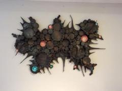 A Wall Sculpture in Blackened Steel and Ceramic - 255653