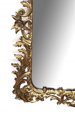 A Well Carved French Rococo Style Giltwood Wall Mirror with Exuberant Crest - 3469952