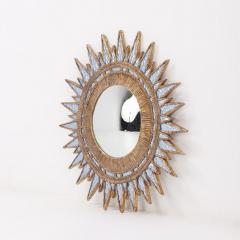 A blue textured glass and resin star form mirror in the manner of Line Vautrin  - 3594745