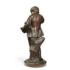 A bronze study of a boy collecting fruit in his wide brimmed hat - 2674535