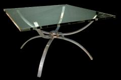 A chic Italian 1960s nickel plated cocktail table with glass top - 58380