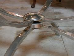 A chic Italian 1960s nickel plated cocktail table with glass top - 58381