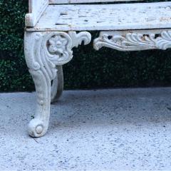 A contemporary white painted cast iron garden bench  - 2241079