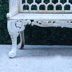 A contemporary white painted cast iron garden bench - 2241256