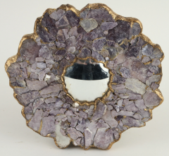 A decorative convex mirror surrounded by faceted stones  - 1173185