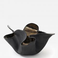 A decorative free form organic bowls in a highly reflective platinum finish - 4309951