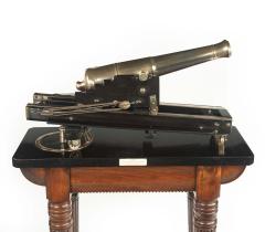 A demonstration or museum model of a civil defence traversing cannon - 3286754