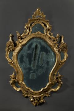 A fine pair of barocchetto escutcheon shaped giltwood mirrors cum girandoles - 4518327