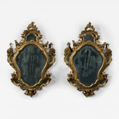 A fine pair of barocchetto escutcheon shaped giltwood mirrors cum girandoles - 4521413