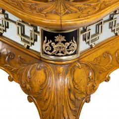 A fine walnut and burr walnut Orientalist centre table - 1115822