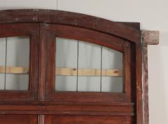 A four panel mahogany window set in frame with leaded glass having ship motif  - 3696128