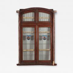 A four panel mahogany window set in frame with leaded glass having ship motif  - 3699215