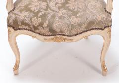 A gilt and painted French upholstered open armchair in the Louis XV style  - 3448461