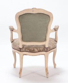 A gilt and painted French upholstered open armchair in the Louis XV style  - 3448465