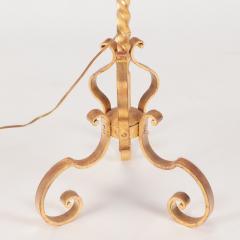 A gilt iron floor lamp in the manner of Raymond Subes C 1940  - 2832111