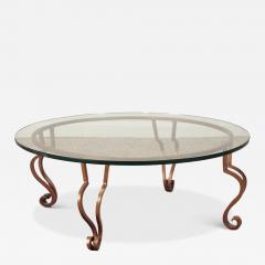 A gilt iron glass top coffee table in the manner of Ramsay circa 1975  - 3570146