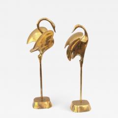 A graceful pair of stylized solid brass cranes - 1029052