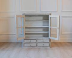 A hanging cabinet from Sweden with glass doors in grey - 4458452