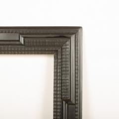A large 19th C Dutch style ebonized carved wood frame mirror - 2107657