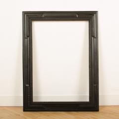 A large 19th C Dutch style ebonized carved wood frame mirror - 2107659