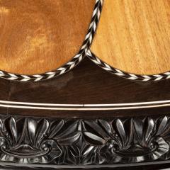 A large Anglo Ceylonese ebony and specimen wood centre table circa 1840 - 1905403