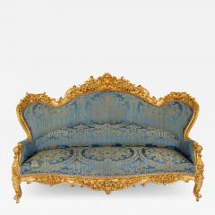 A large Rococo revival carved giltwood sofa - 2868136