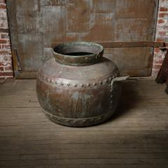 A large hand hammered round shaped brass urn - 2170067