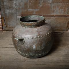 A large hand hammered round shaped brass urn - 2170079