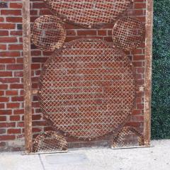 A large pair of iron panels with circle motif C 1940  - 4226177