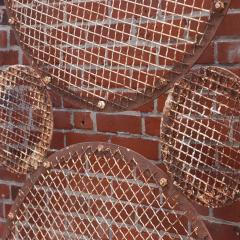 A large pair of iron panels with circle motif C 1940  - 4226178