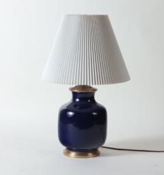 A large single blue porcelain table lamp with gilt base - 2170107