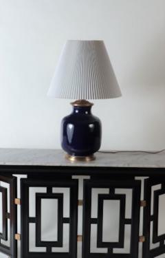 A large single blue porcelain table lamp with gilt base - 2170111