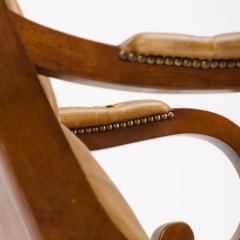 A late 19th Century leather armchair Campaign style - 1646961