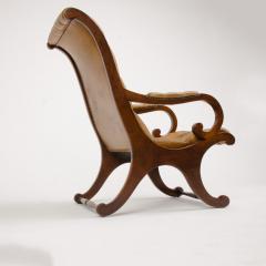 A late 19th Century leather armchair Campaign style - 1646962