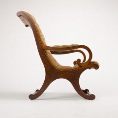 A late 19th Century leather armchair Campaign style - 1646963