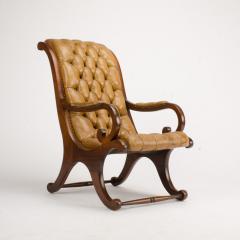A late 19th Century leather armchair Campaign style - 1646972