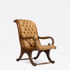 A late 19th Century leather armchair Campaign style - 1647966