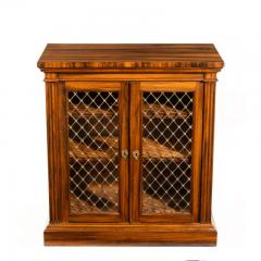 A late Regency Gon alo Alves two door side cabinet attributed to Gillows - 1188207