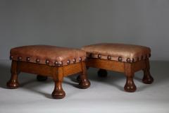A little pair of Aesthetic Movement oak Thebe stools with leather studded seats - 4192363