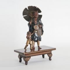 A meiji period bronze of an Oni holding a parasol - 823690