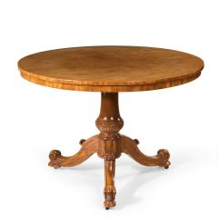 A mid Victorian faded satinwood centre table - 822843