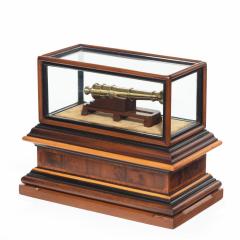 A miniature brass cannon in a presentation case - 1661539