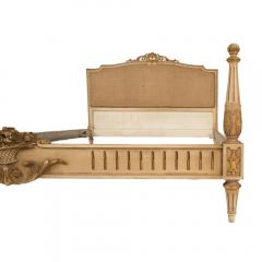 A painted and gilt carved queen size bed C 1940 - 1843858