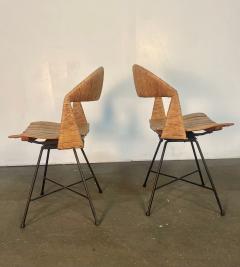 A pair of Arthur Umanoff Swiveling side chairs - 4812339